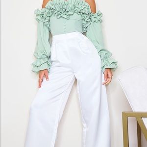 Prettylittlething Green Ruffle Hem Off Shoulder Long Sleeve Top